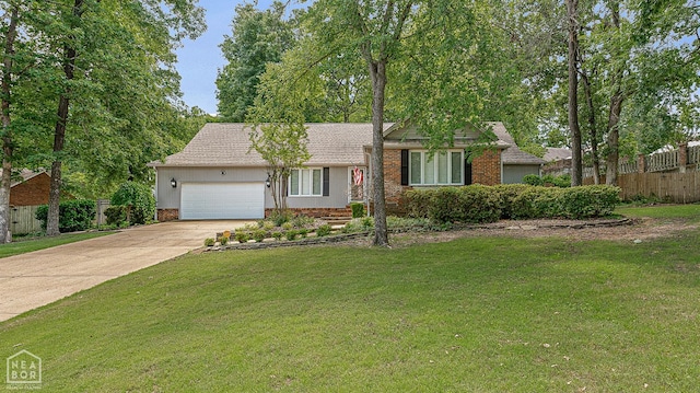 2203 Rankin Cir, Jonesboro, AR 72404 - view of front of house with an attached garage, driveway, brick siding, and roof with shingles