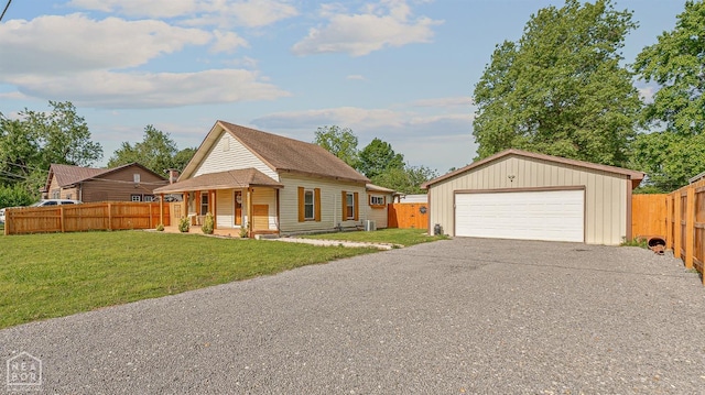 215 N Nance St, Monette, AR 72447 - view of front of property with a garage and covered porch