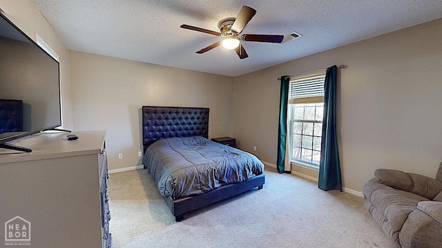 2316 Sheffield Dr, Jonesboro, AR 72405 - bedroom featuring baseboards, a textured ceiling, light carpet, and ceiling fan