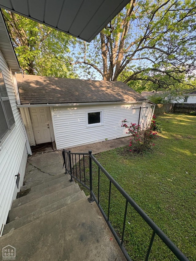 608 W Poplar St W, Paragould, AR 72450 - exterior space featuring a lawn and fence