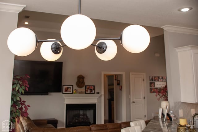 living room featuring recessed lighting and a fireplace