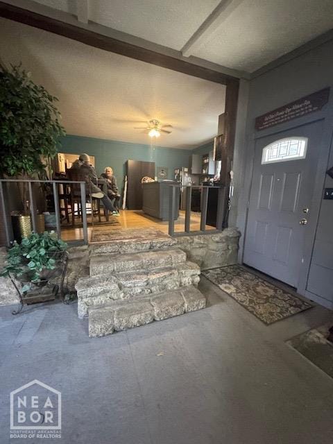 entryway with ceiling fan