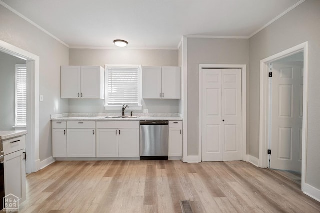 kitchen with dishwasher, a sink, light wood-style flooring, light countertops, and crown molding