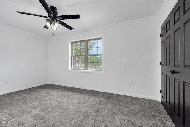 unfurnished bedroom with carpet flooring, crown molding, ceiling fan, and baseboards