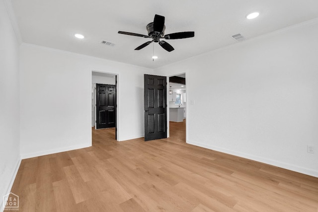 unfurnished bedroom with recessed lighting, light wood-type flooring, and visible vents