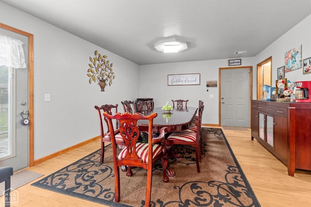 330 Greene 730th Rd, Paragould, AR 72450 - dining area with light wood-style flooring and baseboards