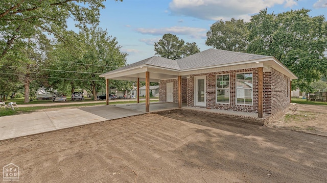 220 Stewart, Monette, AR 72447 - surrounding community featuring concrete driveway and an attached carport