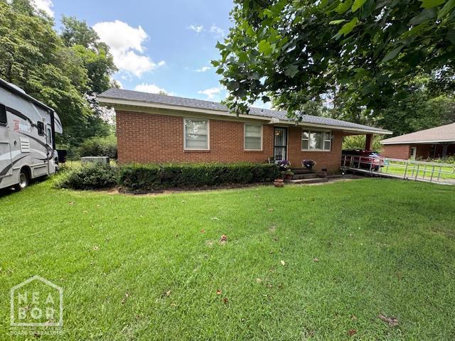 1207 Basil St, Corning, AR 72422 - view of front of property featuring brick siding