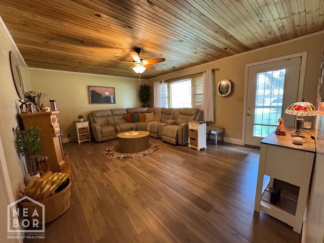 1207 Basil St, Corning, AR 72422 - living area with wooden ceiling, wood finished floors, a ceiling fan, and ornamental molding