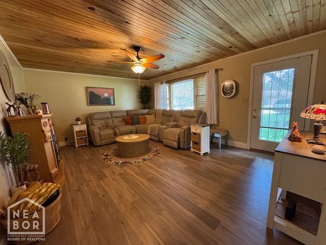 1207 Basil St, Corning, AR 72422 - living room featuring wooden ceiling, wood finished floors, ceiling fan, and crown molding
