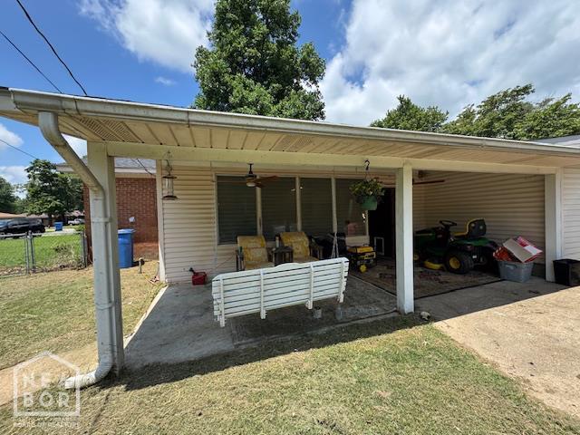 1207 Basil St, Corning, AR 72422 - view of patio / terrace with ceiling fan