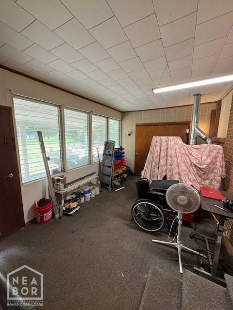 1207 Basil St, Corning, AR 72422 - garage with wooden walls