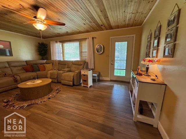 1207 Basil St, Corning, AR 72422 - living area with wood ceiling, wood finished floors, and a ceiling fan