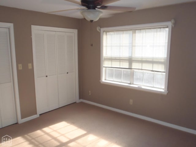1201 Nancy Ave, Newport, AR 72112 - unfurnished bedroom with carpet floors, a ceiling fan, and a closet