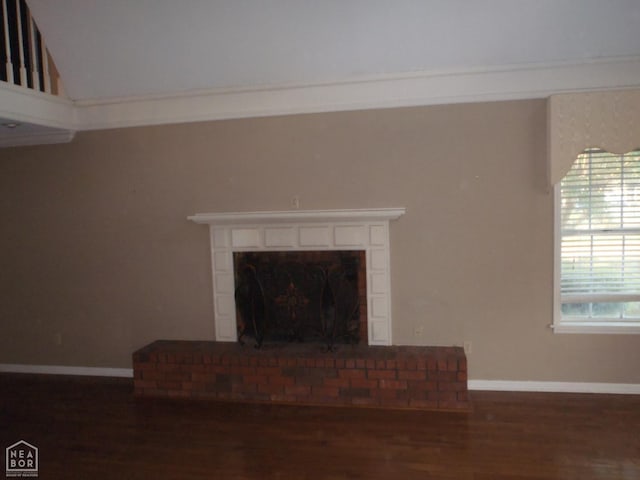 1201 Nancy Ave, Newport, AR 72112 - detailed view of wood finished floors and a fireplace