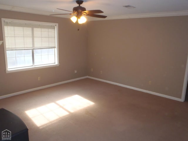 1201 Nancy Ave, Newport, AR 72112 - carpeted spare room with ceiling fan and crown molding