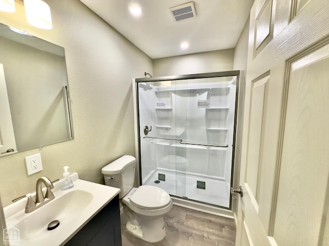 377 N 3rd St, Black Rock, AR 72415 - full bath featuring a shower stall, wood finished floors, and vanity