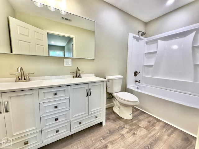 377 N 3rd St, Black Rock, AR 72415 - full bathroom with wood finished floors, double vanity, and bathtub / shower combination