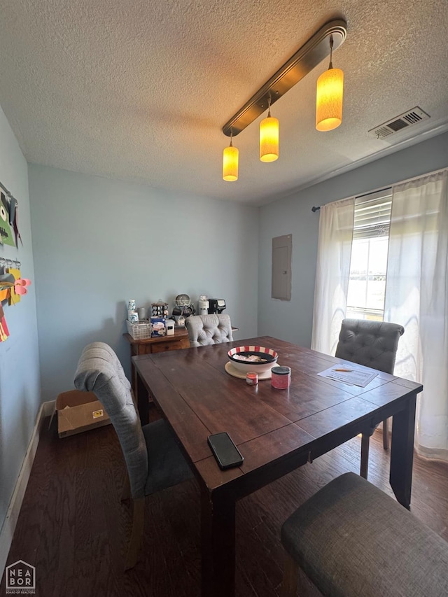 715 S 5th Ave, Paragould, AR 72450 - dining room featuring a textured ceiling and wood finished floors