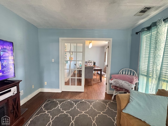 715 S 5th Ave, Paragould, AR 72450 - living room with wood finished floors and a textured ceiling