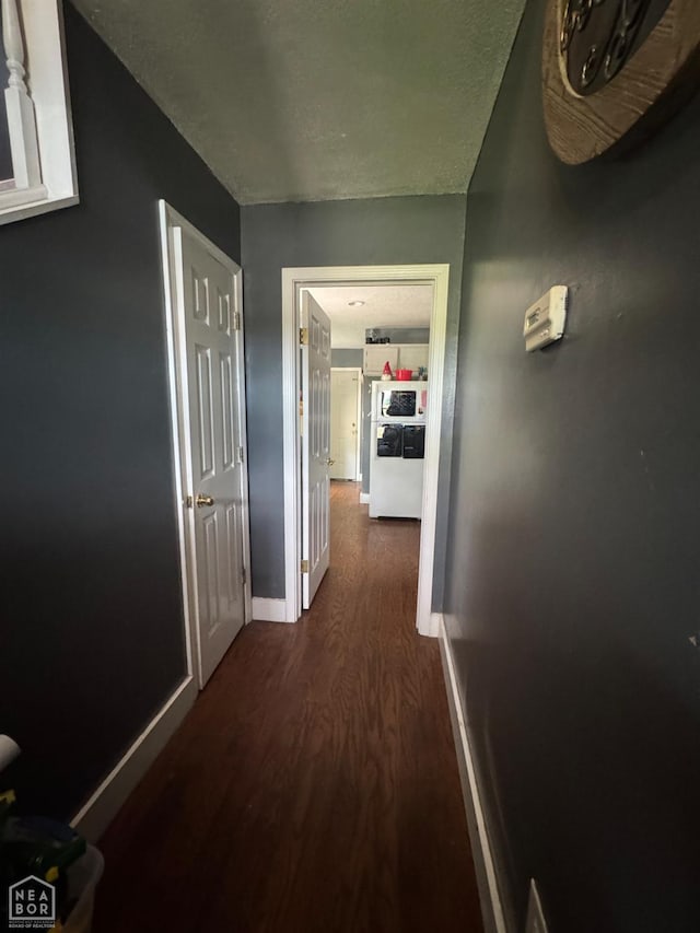 715 S 5th Ave, Paragould, AR 72450 - hall with dark wood-style floors and baseboards