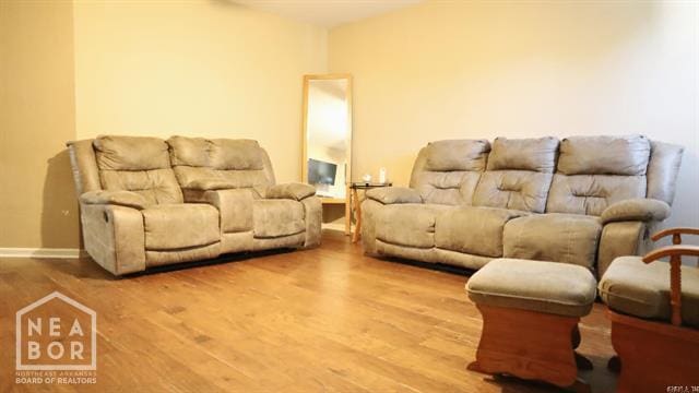 5703 Cedar St, Paragould, AR 72450 - living room with wood finished floors and baseboards