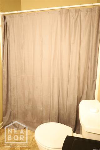 5703 Cedar St, Paragould, AR 72450 - bathroom with toilet