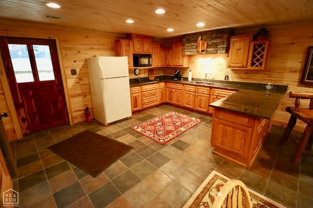 0 Cokley Rd, Warm Springs, AR 72478 - kitchen with black appliances, a sink, a peninsula, dark countertops, and recessed lighting