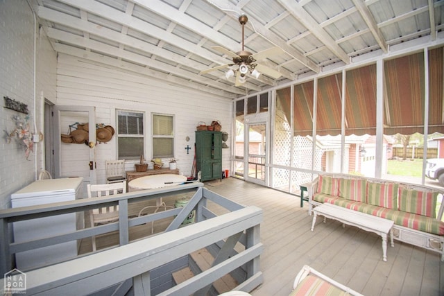 sunroom / solarium with ceiling fan