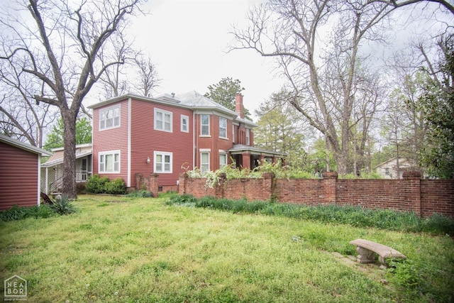 view of yard featuring fence