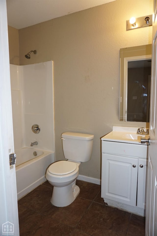 501 E Allen Dr, Jonesboro, AR 72401 - full bathroom featuring vanity, toilet, shower / washtub combination, tile patterned flooring, and baseboards