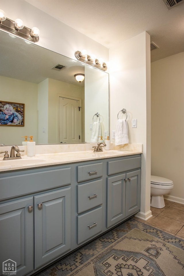 321 Crestfield Dr, Jonesboro, AR 72404 - bathroom featuring double vanity and tile patterned floors