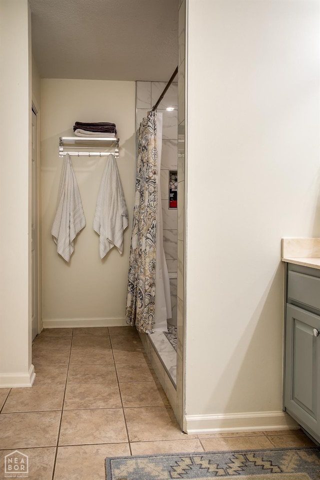 321 Crestfield Dr, Jonesboro, AR 72404 - full bathroom with vanity, a shower stall, and tile patterned floors