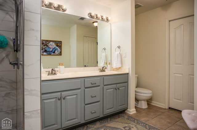 321 Crestfield Dr, Jonesboro, AR 72404 - full bath with double vanity, tile patterned floors, and a shower
