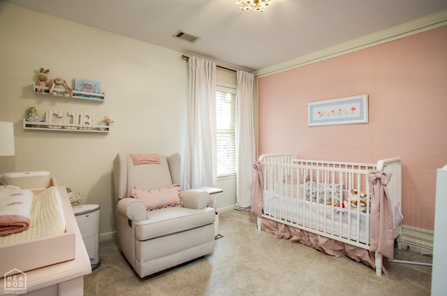321 Crestfield Dr, Jonesboro, AR 72404 - carpeted bedroom with a crib and baseboards