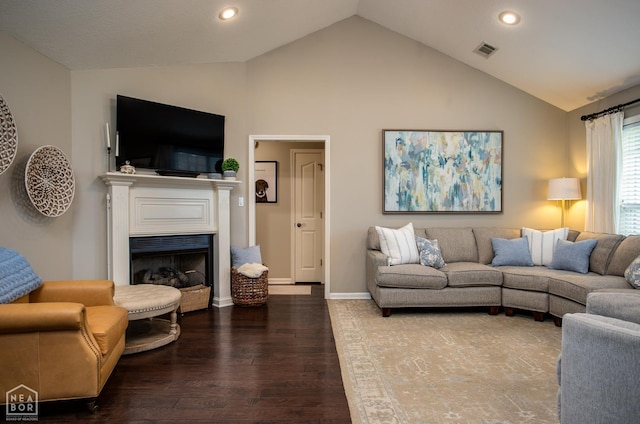321 Crestfield Dr, Jonesboro, AR 72404 - living room with vaulted ceiling, wood finished floors, recessed lighting, and a fireplace
