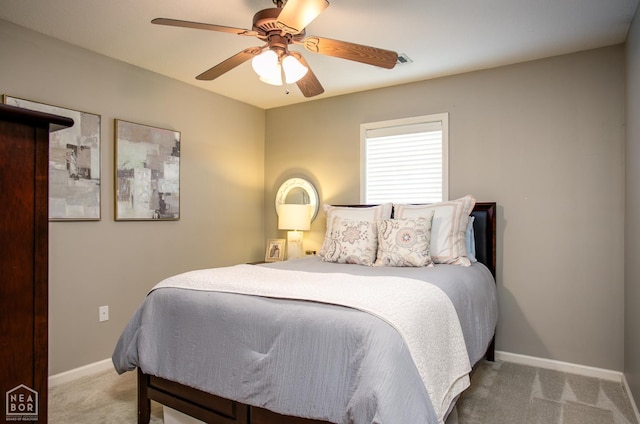 321 Crestfield Dr, Jonesboro, AR 72404 - carpeted bedroom with baseboards and a ceiling fan