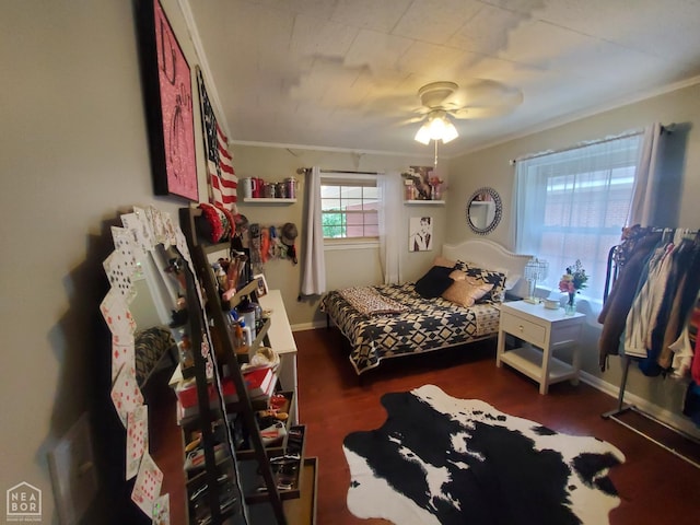 691 Crestline Dr, Piggott, AR 72454 - bedroom featuring crown molding, wood finished floors, and ceiling fan