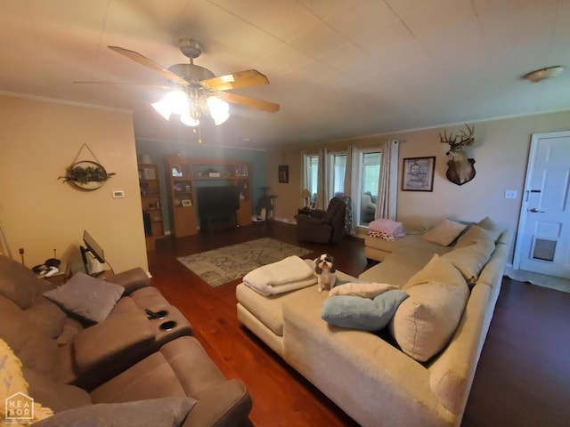 691 Crestline Dr, Piggott, AR 72454 - living room with a ceiling fan, wood finished floors, and ornamental molding