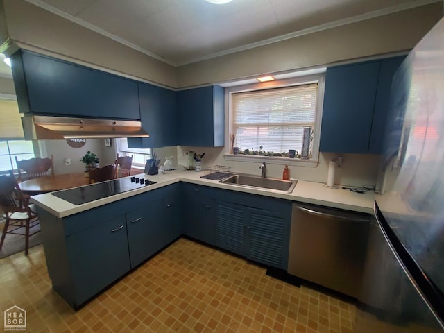 691 Crestline Dr, Piggott, AR 72454 - kitchen featuring stainless steel appliances, blue cabinets, a peninsula, healthy amount of natural light, and crown molding