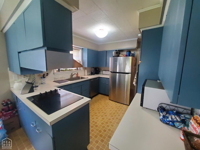 691 Crestline Dr, Piggott, AR 72454 - kitchen with freestanding refrigerator, blue cabinetry, black electric cooktop, a peninsula, and crown molding