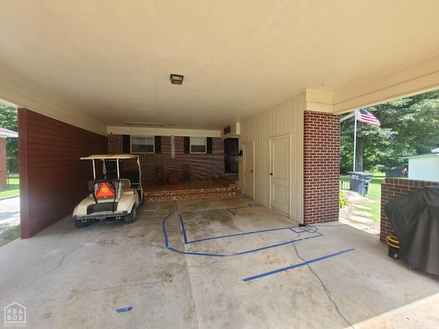 691 Crestline Dr, Piggott, AR 72454 - view of patio with a carport and grilling area