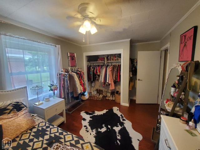 691 Crestline Dr, Piggott, AR 72454 - bedroom with wood finished floors, crown molding, a closet, and ceiling fan