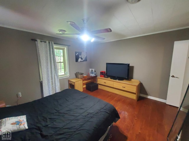 691 Crestline Dr, Piggott, AR 72454 - bedroom with wood finished floors, crown molding, and a ceiling fan