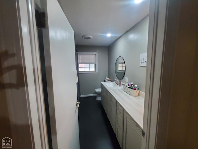 691 Crestline Dr, Piggott, AR 72454 - bathroom with toilet and vanity