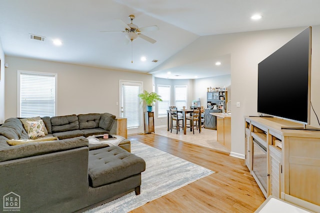 1409 Hemingway Cir, Jonesboro, AR 72405 - living area featuring a ceiling fan, light wood-type flooring, vaulted ceiling, baseboards, and recessed lighting