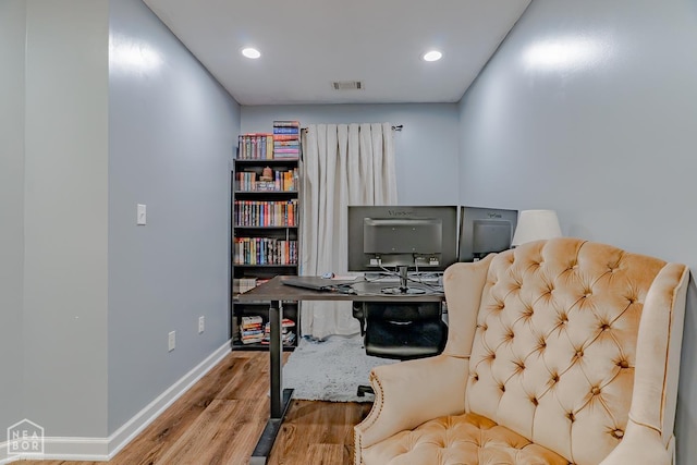 1409 Hemingway Cir, Jonesboro, AR 72405 - office featuring wood finished floors, baseboards, and recessed lighting