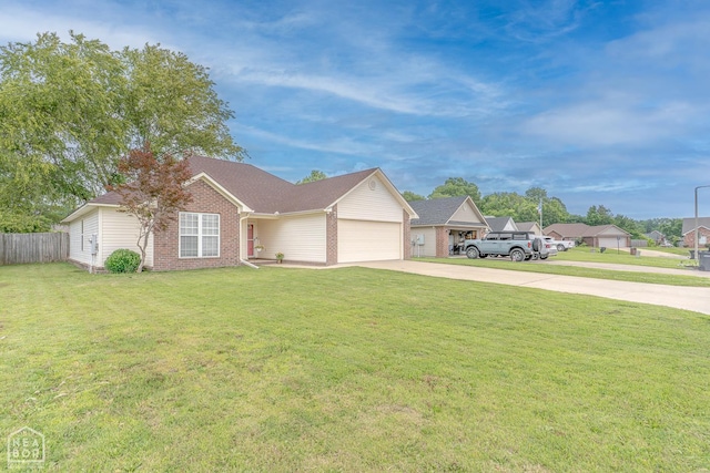 1409 Hemingway Cir, Jonesboro, AR 72405 - ranch-style home with concrete driveway, brick siding, and a garage