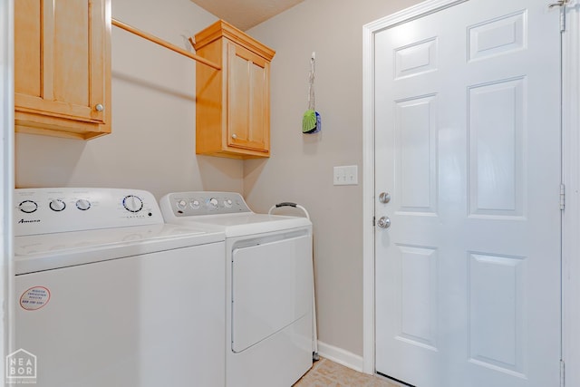 1409 Hemingway Cir, Jonesboro, AR 72405 - washroom with independent washer and dryer, cabinet space, and baseboards