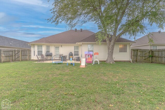 1409 Hemingway Cir, Jonesboro, AR 72405 - rear view of property featuring a patio area